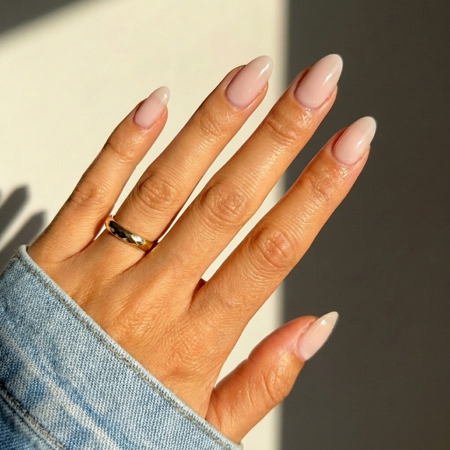 Neutral gel polish worn on healthy natural nails