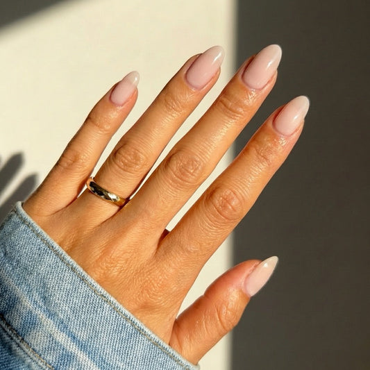 Neutral gel polish worn on healthy natural nails